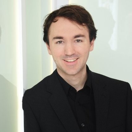 A portrait of Alexander Oster, Director of Additive Manufacturing at Autodesk
